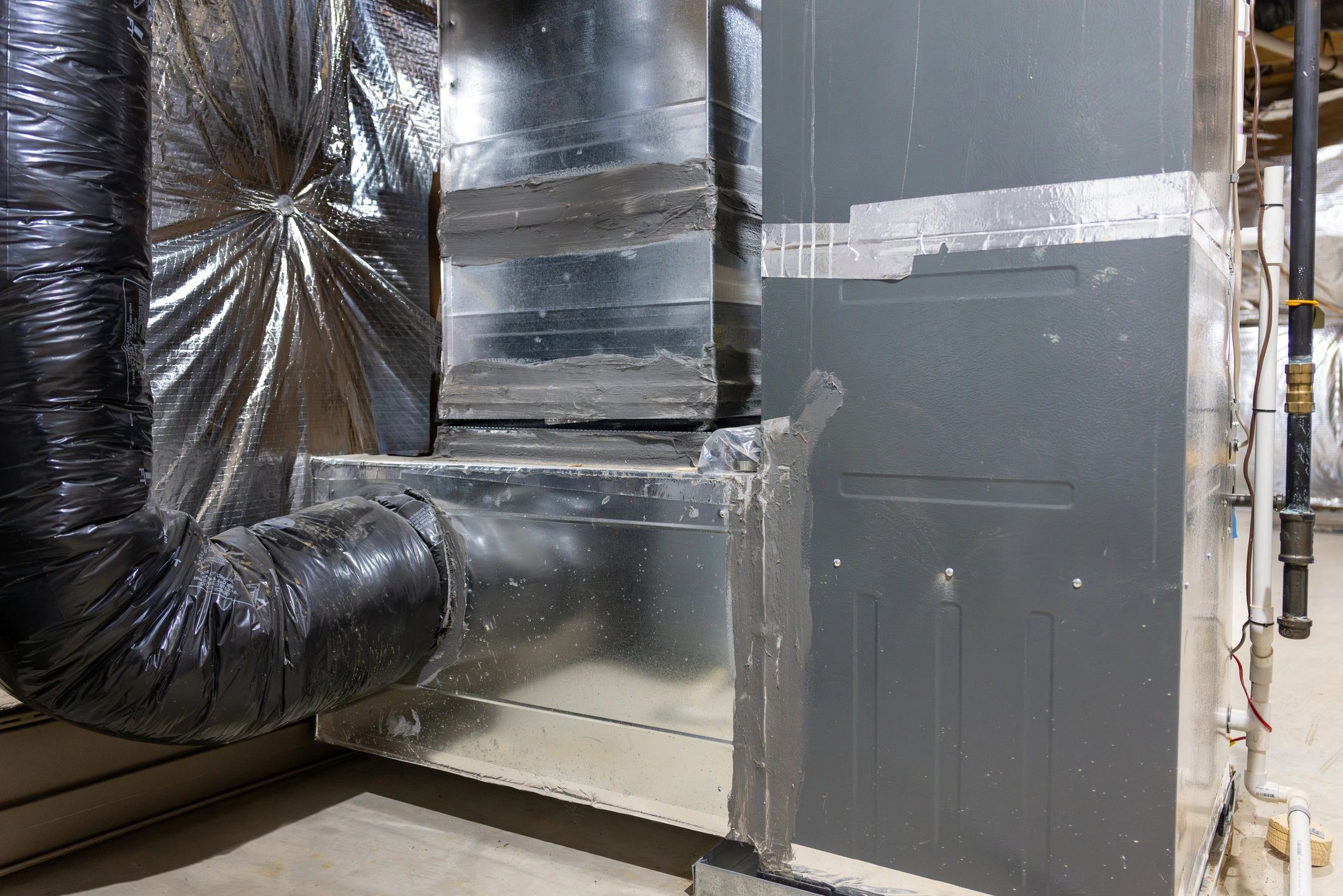 Residential furnace and ductwork in a basement
